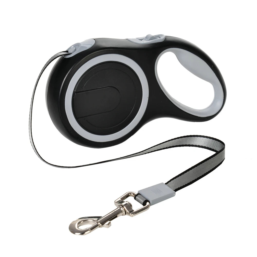 Black and gray retractable dog leash on a white background